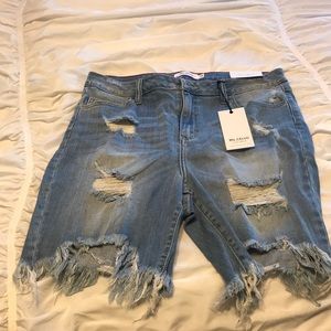 Distressed denim shorts